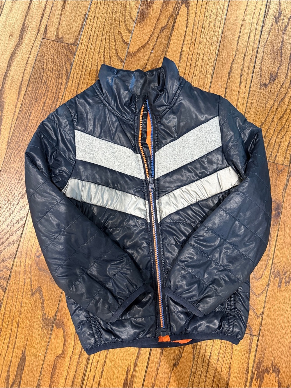 Ikks Navy Puffer Jacket with Silver Chevron and Orange Trim